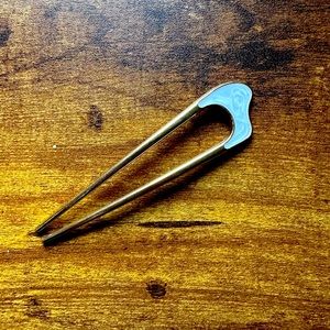 Gold hair pin with white accent